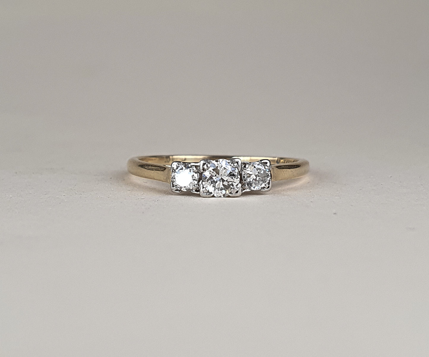 Three Stone Edwardian Diamond Ring in Gold and Platinum.