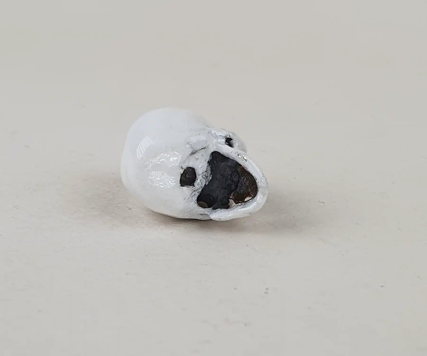 Antique White Enamel Skull Pendant with Garnet Eyes and Gold Teeth