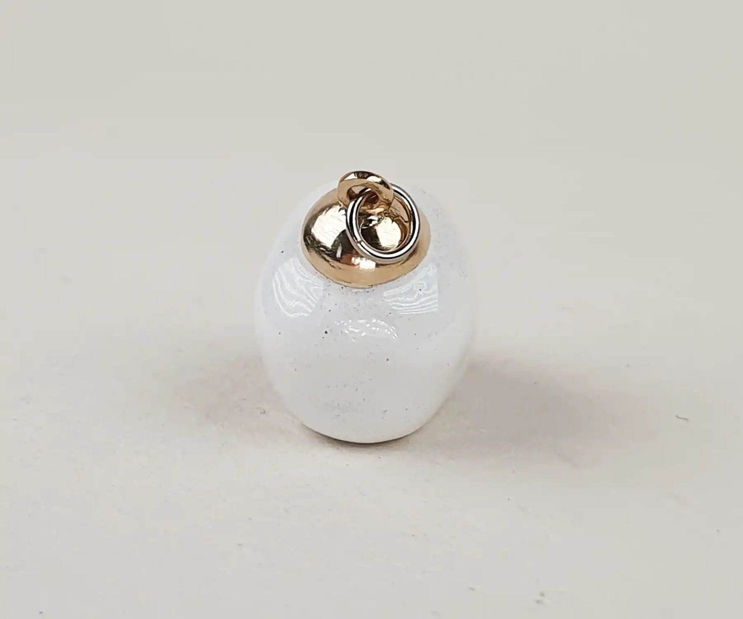 Antique White Enamel Skull Pendant with Garnet Eyes and Gold Teeth