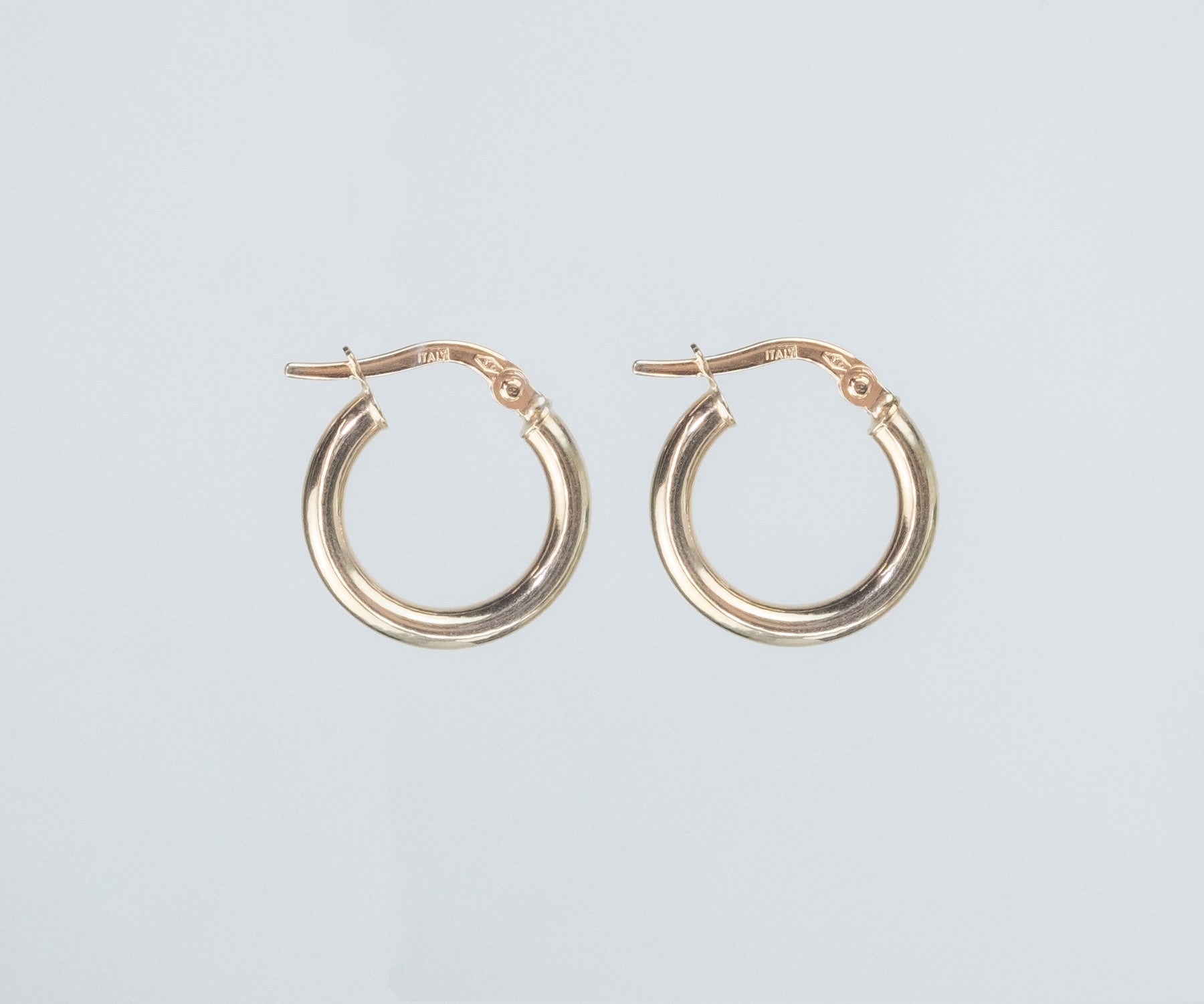 Simple gold hanging on sale earrings