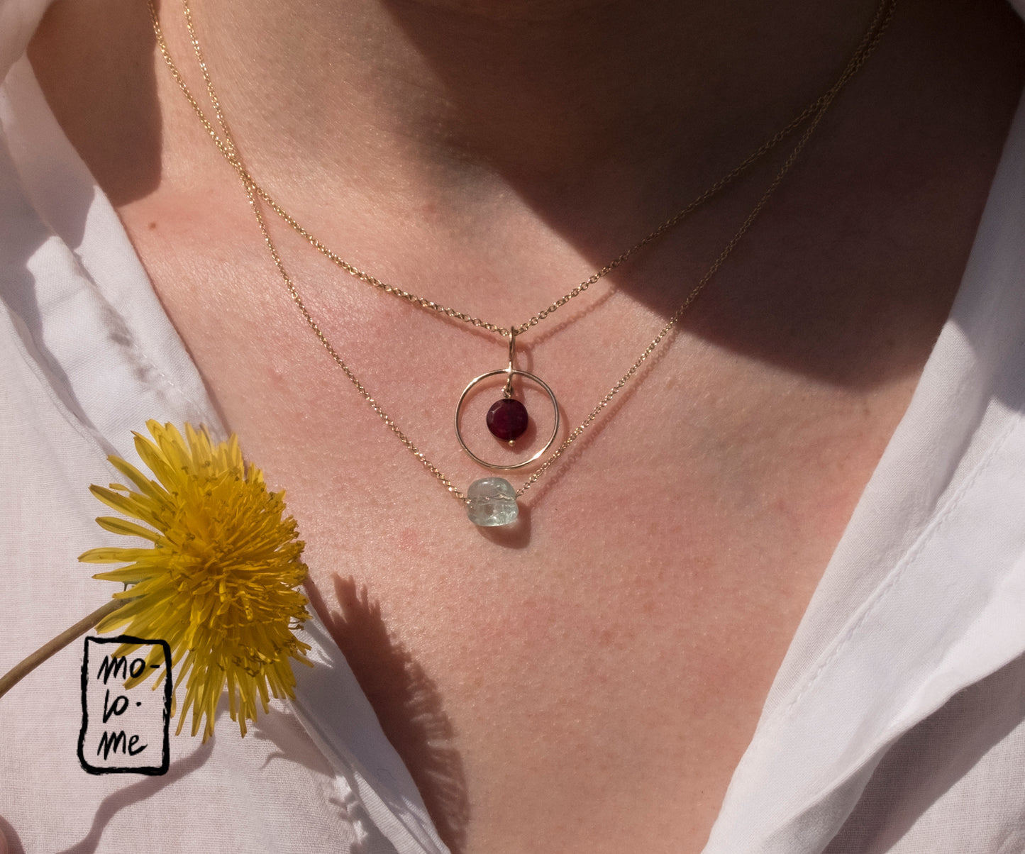 Mama Ania Aquamarine Necklace together with Garnet Halo Necklace on model