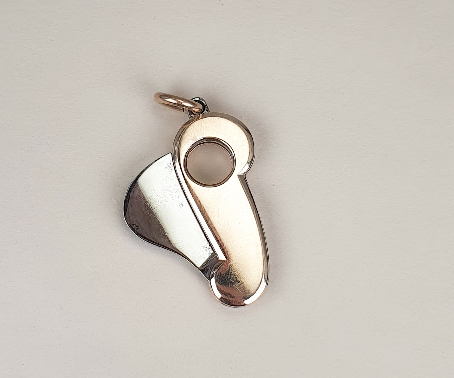 Vintage Gold and Steel Cigarillo Cutter Pendant