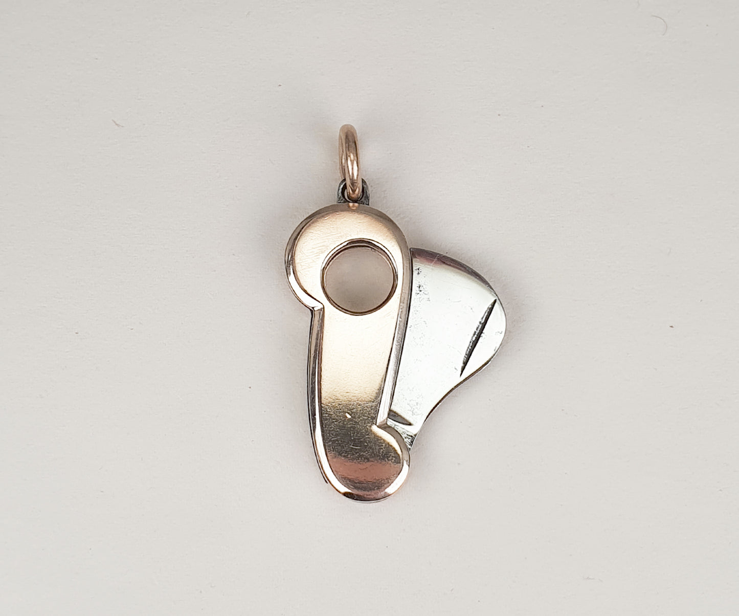 Vintage Gold and Steel Cigarillo Cutter Pendant