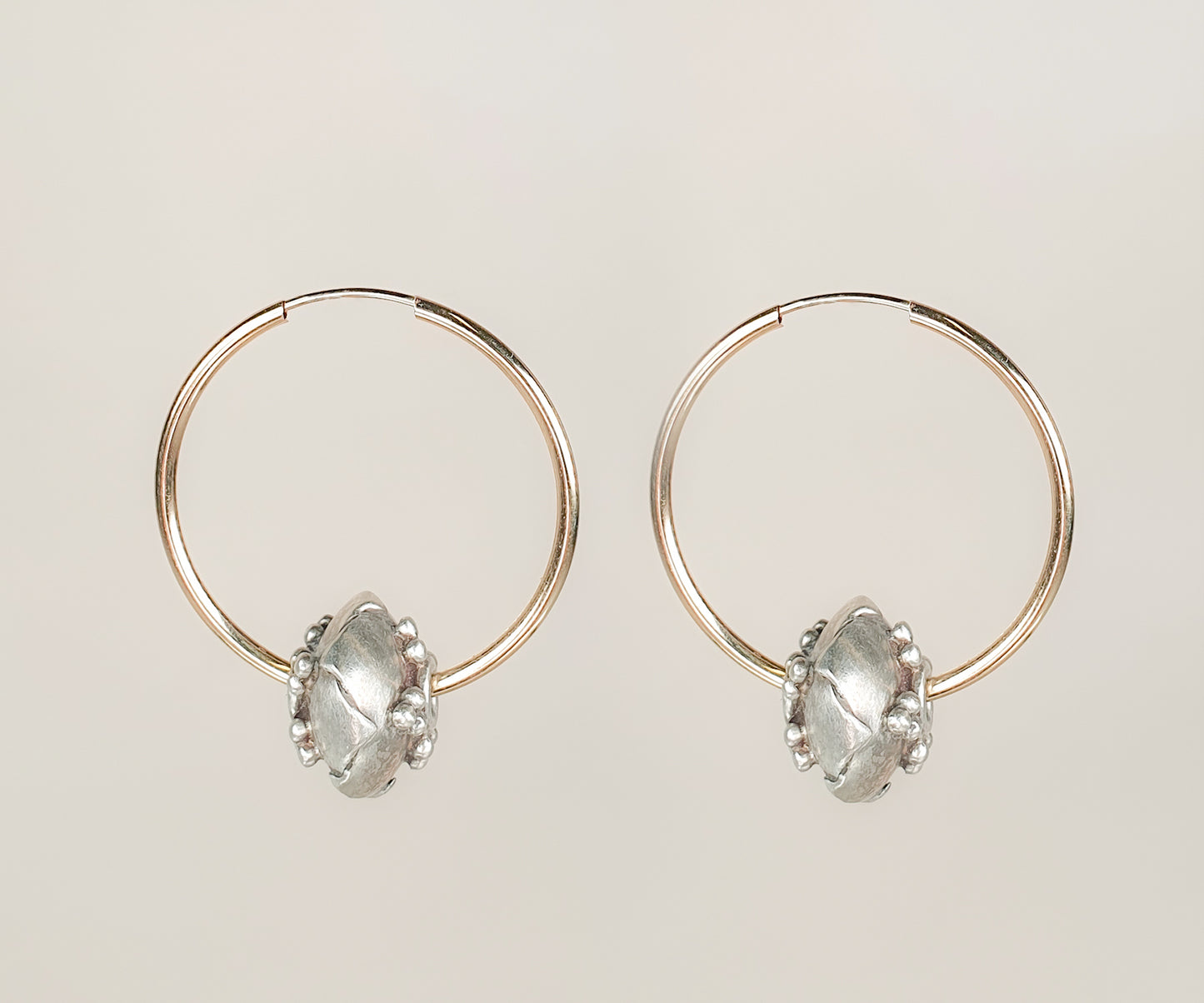 Large gold hoops with recycled vintage silver beads