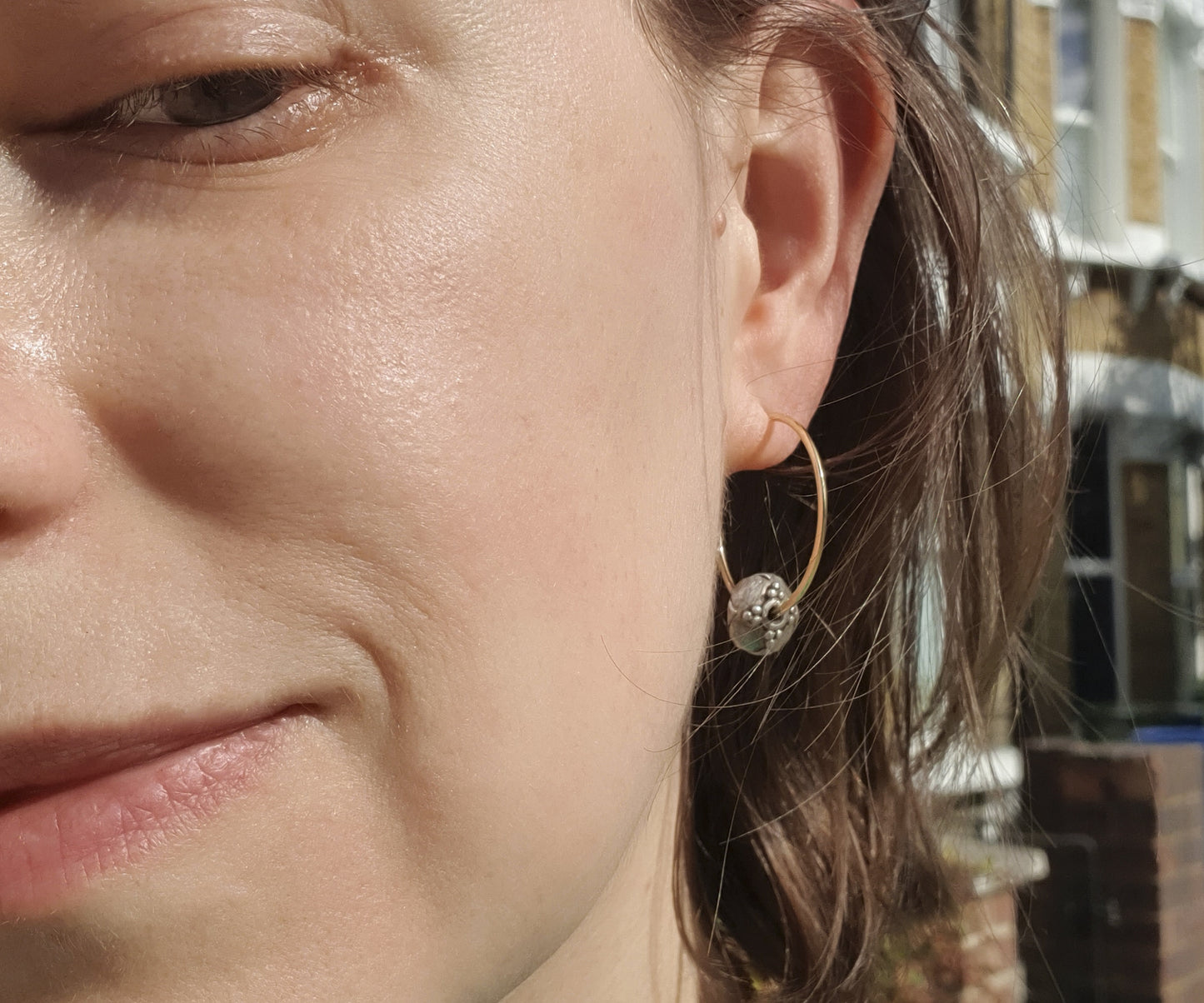 Large gold hoops with recycled vintage silver beads
