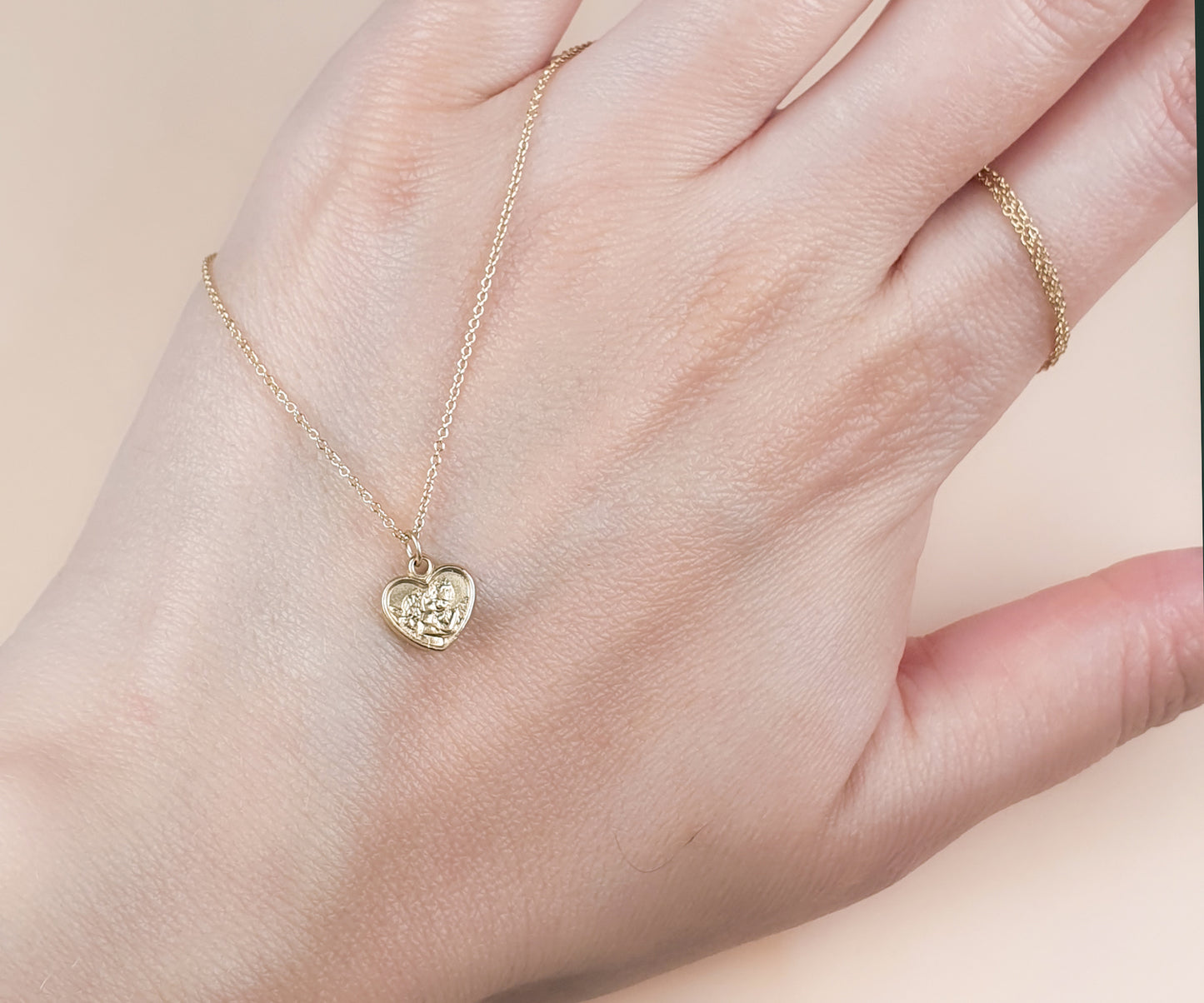 Heart Shaped Kissing Cherub Necklace