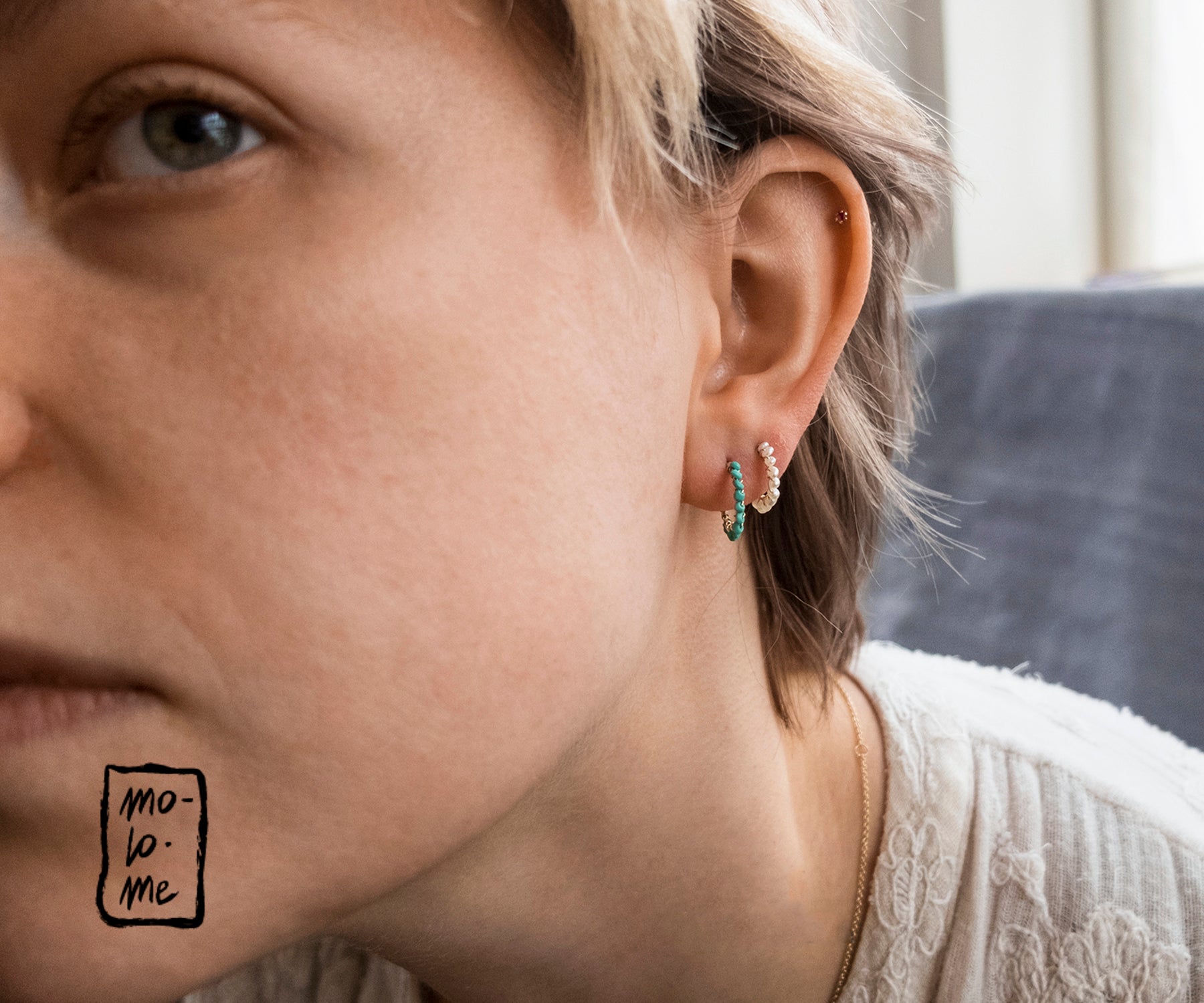 Small Aga Turquoise and Gold Hoops on a model