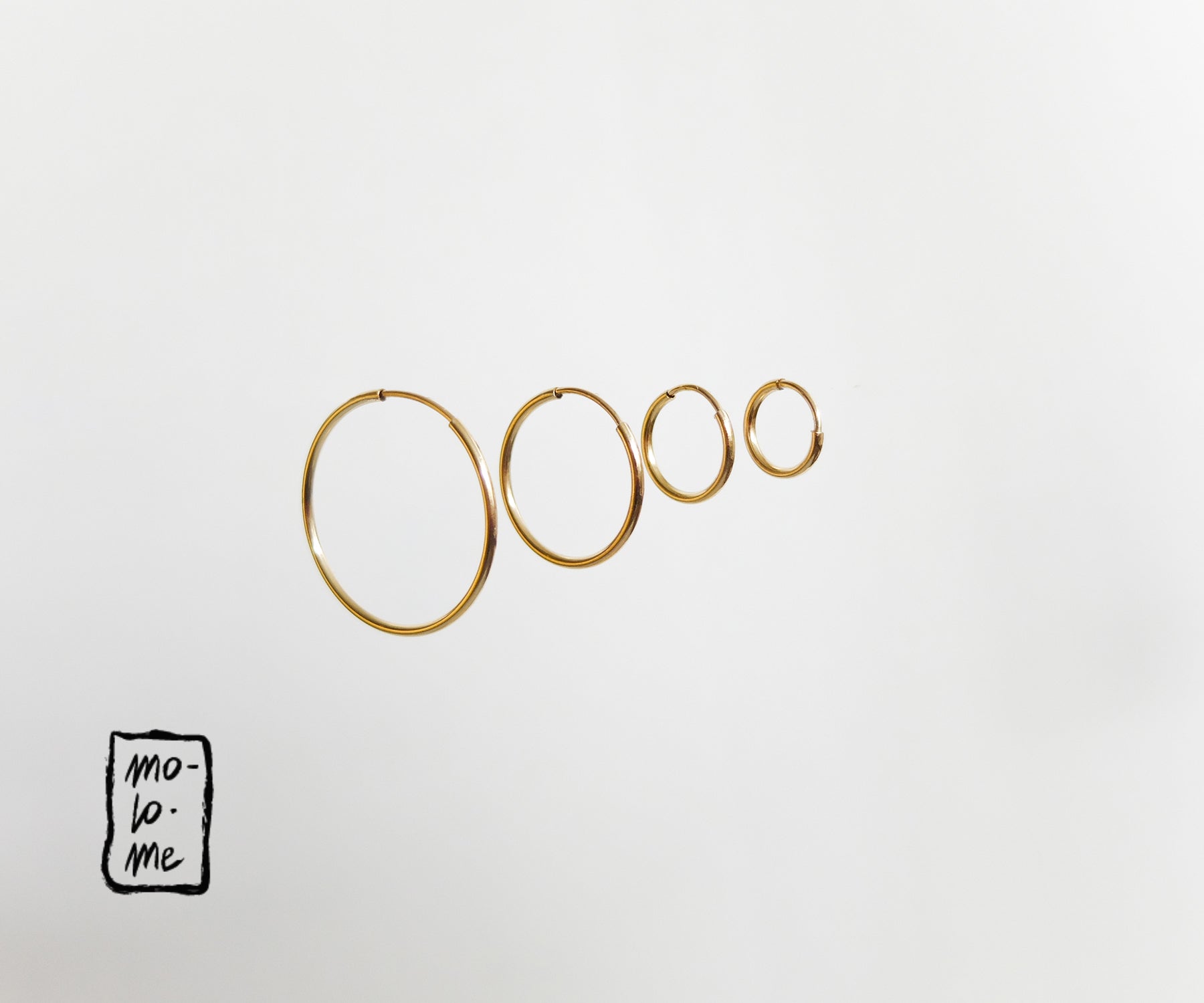 Gold-Filled Plain Small, Medium and Large Hoop Earrings at 9mm, 12mm, 16mm and 20mm.