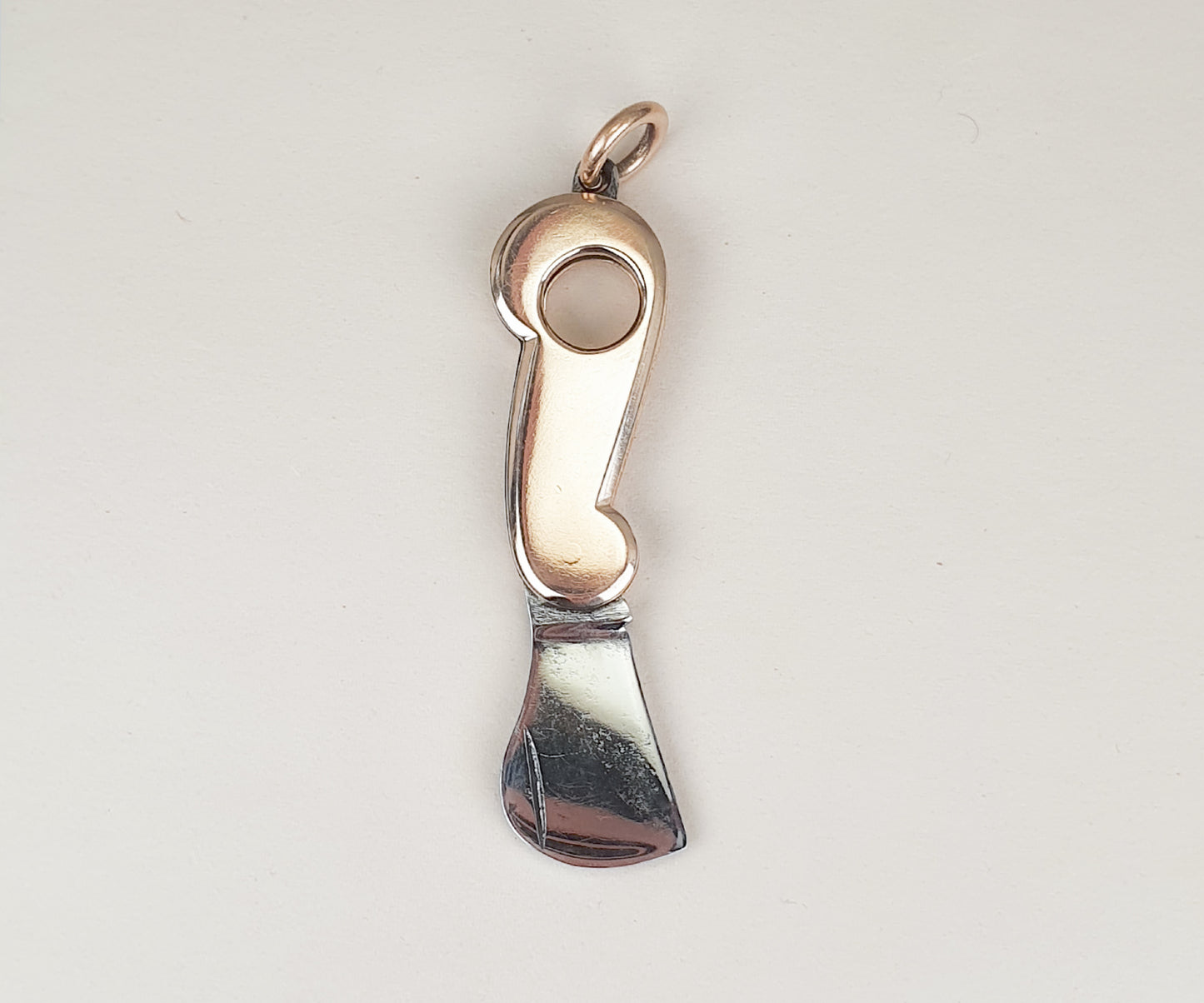 Vintage Gold and Steel Cigarillo Cutter Pendant