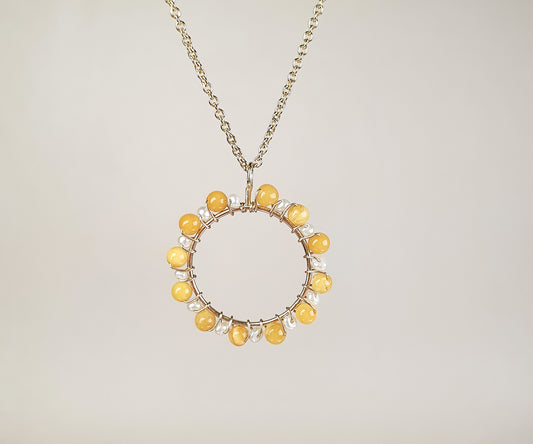 Merry-Go-Round Aga Necklace with Seed Pearls and Amber.