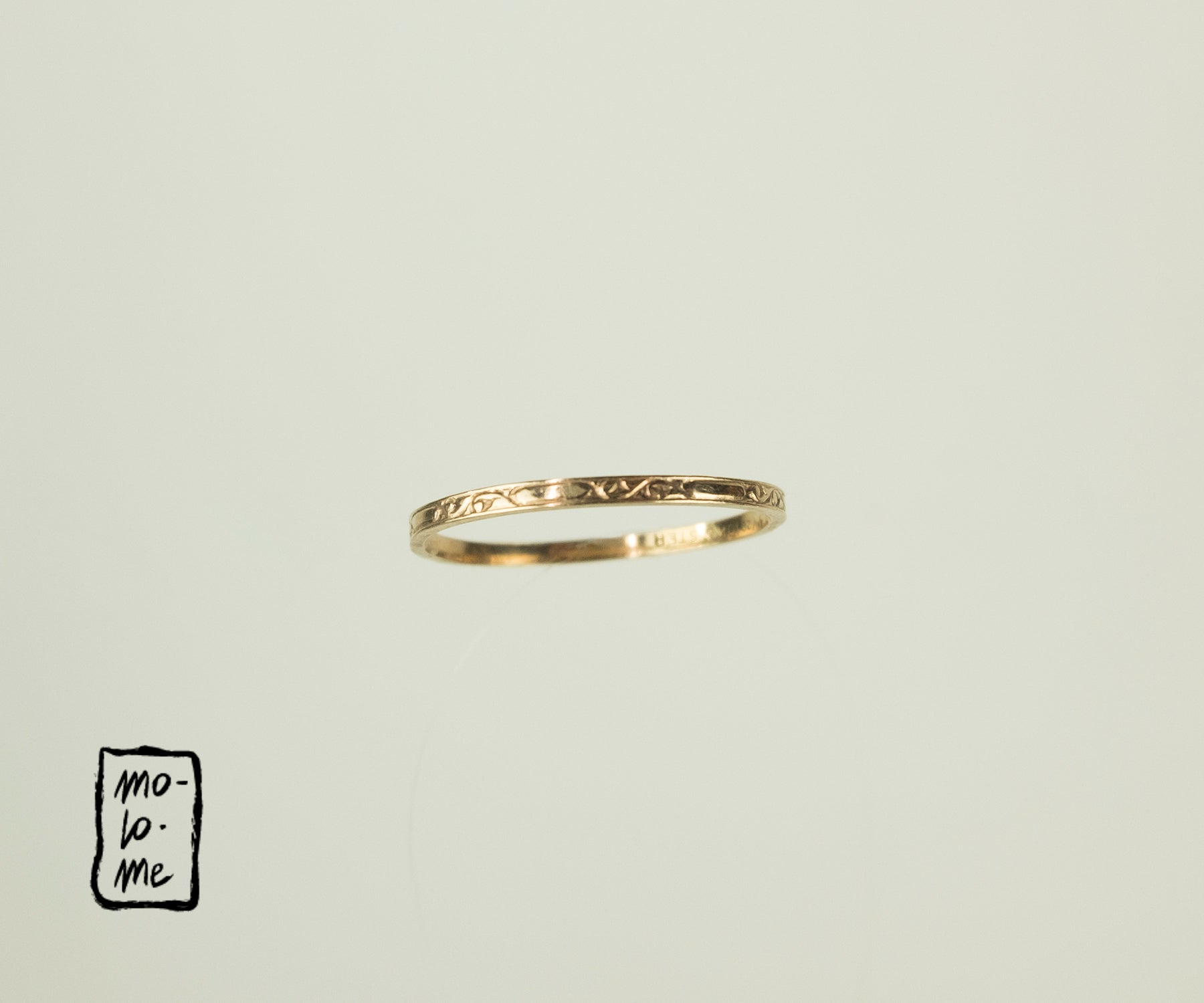 Vintage Skinny Engraved Gold-Plated Stacking Rings by Molo Me angle view