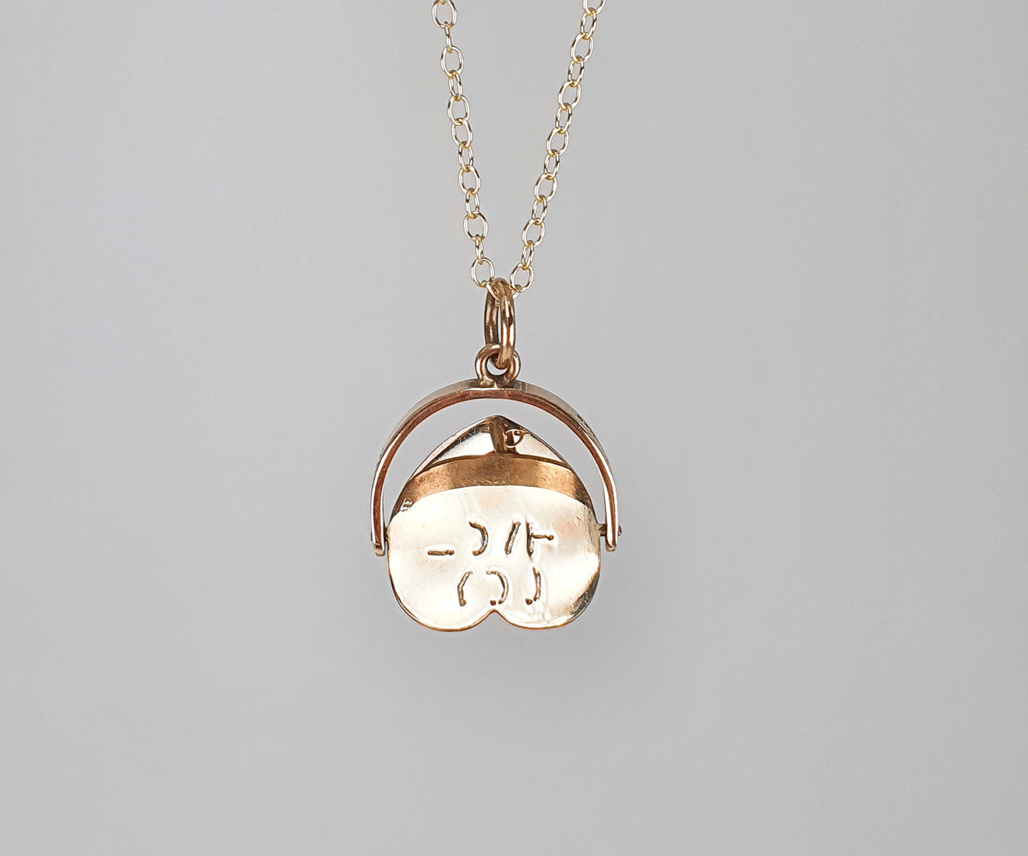 Vintage Heart-Shaped Spinning I Love You Necklace